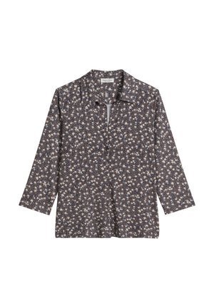 Button-up long-sleeve shirt with dark background and small beige and white floral pattern, spread collar, laid flat.