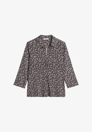 Button-up long-sleeve shirt with dark background and small beige and white floral pattern, spread collar, laid flat.