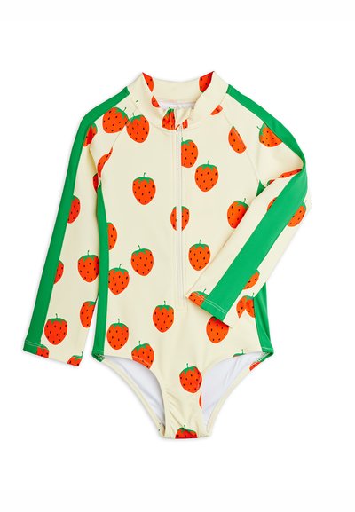 Μαγιό μακρυμάνικο σε κρεμ χρώμα με φερμουάρ μπροστά, πράσινες πλαϊνές πινακίδες και κόκκινο μοτίβο φράουλας σε όλη την επιφάνεια.