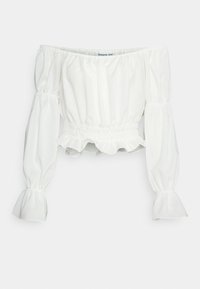 Blusa bianca a spalle scoperte con lunghe maniche a sbuffo, vita arricciata e orlo volante. Realizzata in tessuto leggero. Texture liscia.