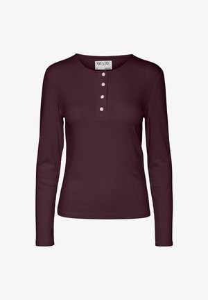 Dugi rukav u boji bordo s okruglim izrezom, rebrastom teksturom i pet dugmadi sprijeda. Jednostavan, uski dizajn.