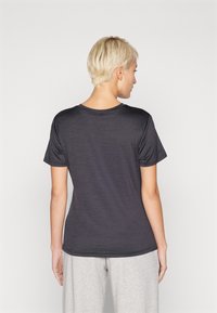 Dark gray, short-sleeved T-shirt with a round neckline. Smooth texture and fitted design, showing a minimalistic style without patterns.