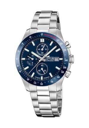 Silver stainless steel chronograph watch with a blue dial, tachymeter bezel, three sub-dials, and luminous hour markers. 10 Bar water-resistant.