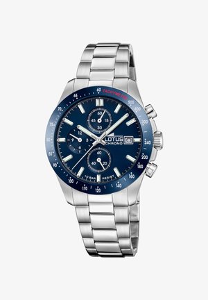 Silberner Edelstahl-Chronograph mit blauer Ziffernblatt, Tachymeter-Lünette, drei Teilzeitanzeigen und leuchtenden Stundenmarkierungen. 10 Bar wasserdicht.
