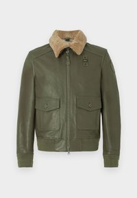 Giacca di pelle verde oliva con colletto in shearling beige, zip frontale, due tasche a patta con bottone e polsini e vita a maglia.