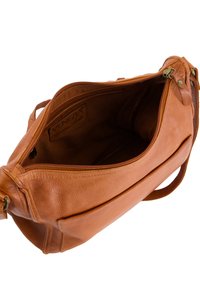 Tan leather crossbody bag with a textured finish, featuring a zip closure and interior pocket, showcasing a spacious and structured design.