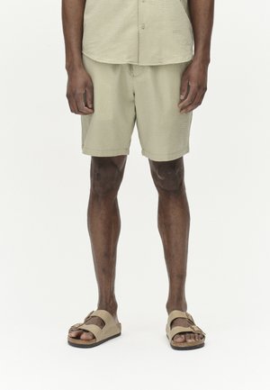 TOMMI SEER - Shorts - green sea