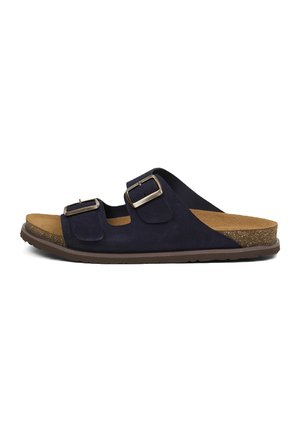 Marineblauwe slide-sandaal met twee verstelbare gespsluitingen, kurken voetbed en bruine rubberen zool.