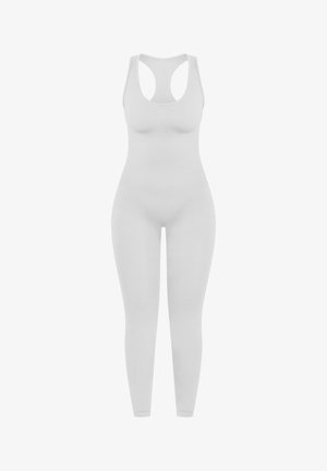 Body bianco a coste con scollo rotondo e design a schiena scoperta. Forma aderente, maniche lunghe, costruzione senza cuciture e texture liscia.