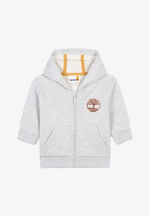 Felpa grigia con zip, dotata di cappuccio foderato, tasche frontali, polsini e orlo a costine. Presenta un logo alberato ricamato marrone sul petto.