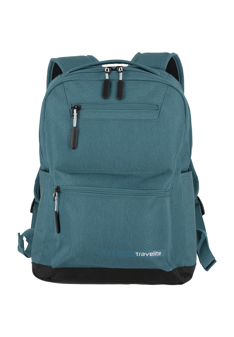 Zaino in tessuto color teal con superficie testurizzata, dotato di due tasche con zip, spallacci regolabili e un fondo nero. Logo visibile sulla parte anteriore.