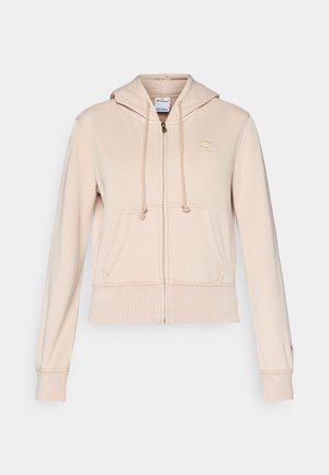 Beige zip-up hette laget av myk stoff. Har hette, snor i hetten, frontlommer og forhøyet logo på brystet. Ribbestrikkede mansjetter og kant.