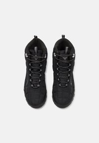 Black hiking boots with a quilted texture, featuring gray laces, a padded collar, and pull tabs at the rear for easy wear.