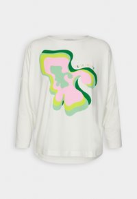 Valkoinen pitkähihainen paita, jossa on abstrakti kuvio pinkissä, vihreässä ja vaaleanvihreässä. Teksti luidnea "HELLO FUTURE." Sileä kangas.