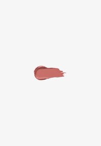 Smooth brushstroke of muted rose-colored makeup on plain white background.