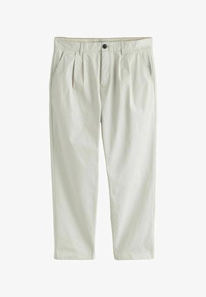 Világos bézs férfi nadrág elöl sliccel, oldalzsebekkel, övbújtatókkal, gombos záródással és egyenes szárú szabással.