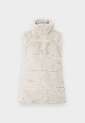 Lys beige kunstpelsvest med opprett krage, full frontglidelås og horisontale sømdetaljer over kroppen for tekstur.