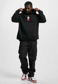 Thug Life SABOTEUR HOODY - Jersey con capucha - black