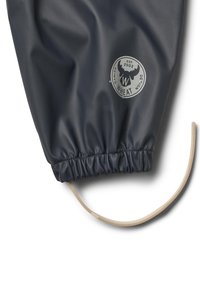 Manchette imperméable gris foncé avec poignet élastique et cordon beige, avec un logo rond représentant une tête d'élan et texte "Wheat Danish Design est 2002."