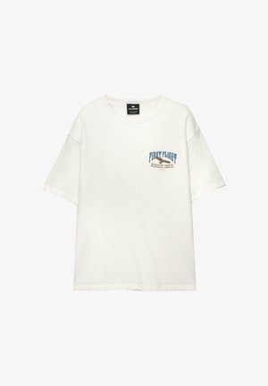 Bijela pamučna majica s kratkim rukavima, s plavim i smeškim printom na prednjoj strani koji glasi "PRVI LET HORIZON CHECK 1991."