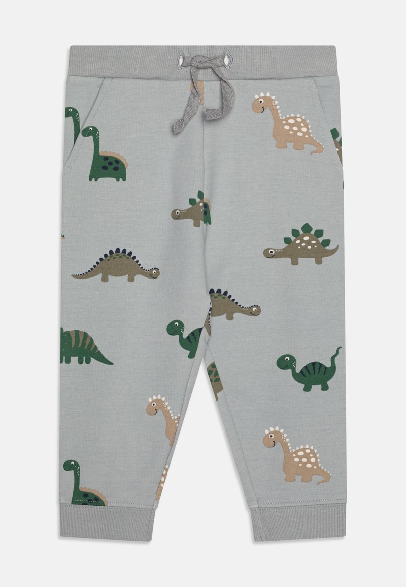 Pantalon gris clair pour tout-petit avec une taille élastique et un cordon noué, décoré de dinosaures dessin animés colorés en vert, beige et marron.