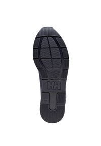 Suola della scarpa in gomma nera con un design testurizzato, caratterizzata da un logo riconoscibile, un motivo a griglia e scanalature per la trazione.