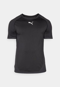 Sort T-shirt med korte ærmer til atletisk brug, lavet af glat stof med strukturerede skulderpaneler. Har et hvidt logo på brystet.