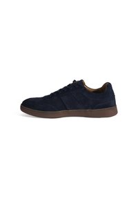 Navy suede sneaker with a low profile, lace-up front, textured panels, and a brown rubber sole. Features minimal branding and stitching accents.