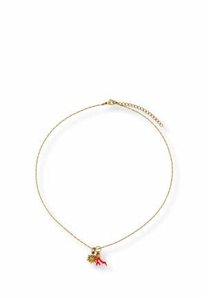 Delicate gold chain necklace with sun charm and small red coral-shaped pendant on a white background.