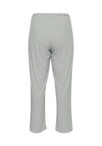 Black and white striped leggings with an elastic waistband, loose fit, and slightly flared ends. Made from a soft, stretchy fabric.