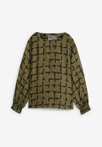 Blusa verde oliva realizzata in tessuto liscio, con un motivo a croce nero. Maniche lunghe con polsini elastici e scollatura rotonda.