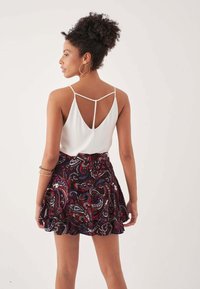 Herita PATTERNED RUFFLED - Gonna a pieghe - red