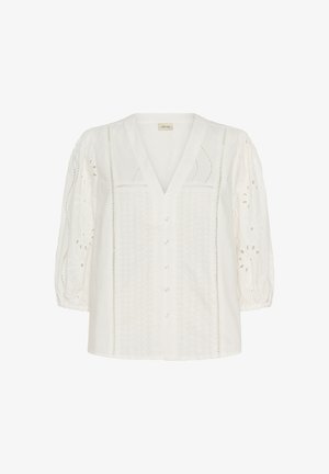 Hvid bomuldsskjorte med V-hals, knappelukning foran, puffede ærmer, broderie anglaise-detaljer og teksturerede mønstre langs kroppen.