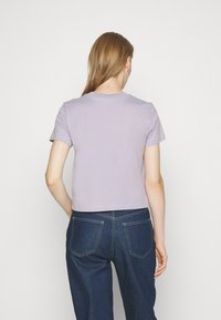Calvin Klein Jeans SMALL MONOLOGO BABY TEE - Základné tričko - lavender aura