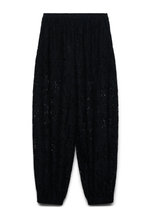 Pantalon ample en dentelle noire avec taille élastique et poignets froncés, présentant un motif floral sur l'ensemble du tissu.