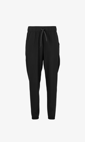 Zwarte joggerbroek met een elastische tailleband, verstelbaar trekkoord, zijzakken, taps toelopende pijpen en elastische boorden. Glad stofgevoel.