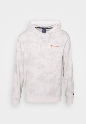 White tie-dye hoodie with a front pocket and drawstring hood. Features an orange Champion logo on the chest. Soft, fleece-like texture.