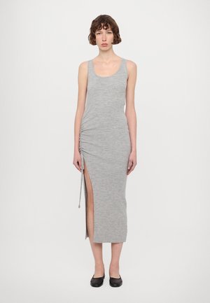 Gray ribbed sleeveless dress with side ruching, slit on the left, and adjustable drawstring. Ankle-length, featuring a smooth texture.
