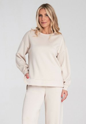 - Bluza