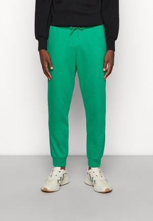 UNISEX - Tracksuit bottoms - green