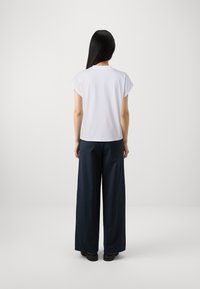 KARL LAGERFELD SIGNATURE - T-shirts - white