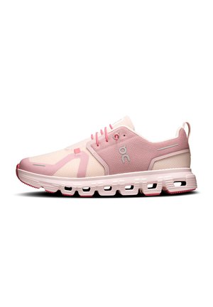 Light pink breathable running shoe with mesh upper, cushioned sole with segmented design, and lace-up closure, viewed from the side.