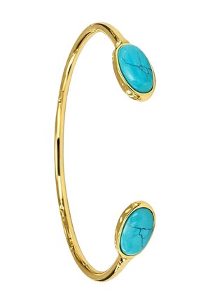 Pulsera de oro abierta con engastes de piedra turquesa ovalada en cada extremo, con detalles de vetas naturales.
