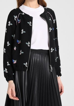 Chaqueta fina - black