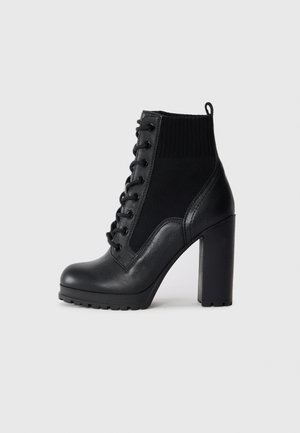 REBELLIOUS - Bottines à talons hauts - black