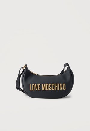 Black crescent-shaped shoulder bag with gold "LOVE MOSCHINO" lettering and adjustable strap, set against a plain white background.