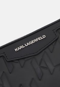 KARL LAGERFELD LOOM LEA VANITY CASE - Wash bag - black