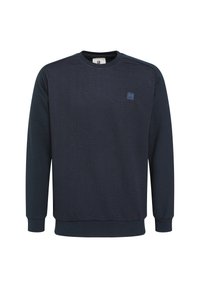 Felpa blu navy realizzata in tessuto testurizzato con un motivo a costine diagonali, collo rotondo e una piccola toppa con logo sulla parte anteriore.