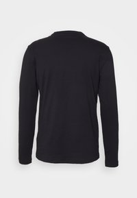 Long-sleeve black T-shirt made from a soft cotton blend, featuring a crew neck and a relaxed fit, with no visible patterns or accents.