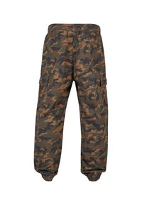 Pantalon cargo camouflage pour hommes avec taille élastique et bas de jambes resserrés, doté de poches latérales et arrière.